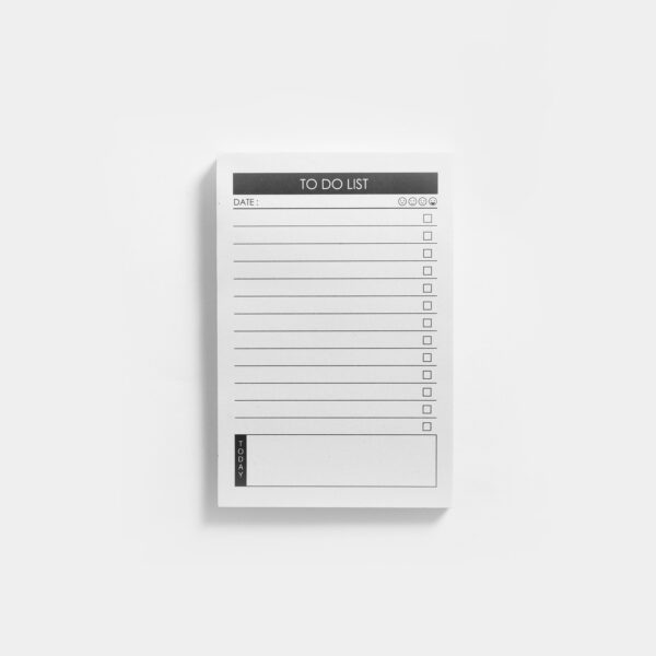 A white surface displaying a minimal daily schedule notepad.