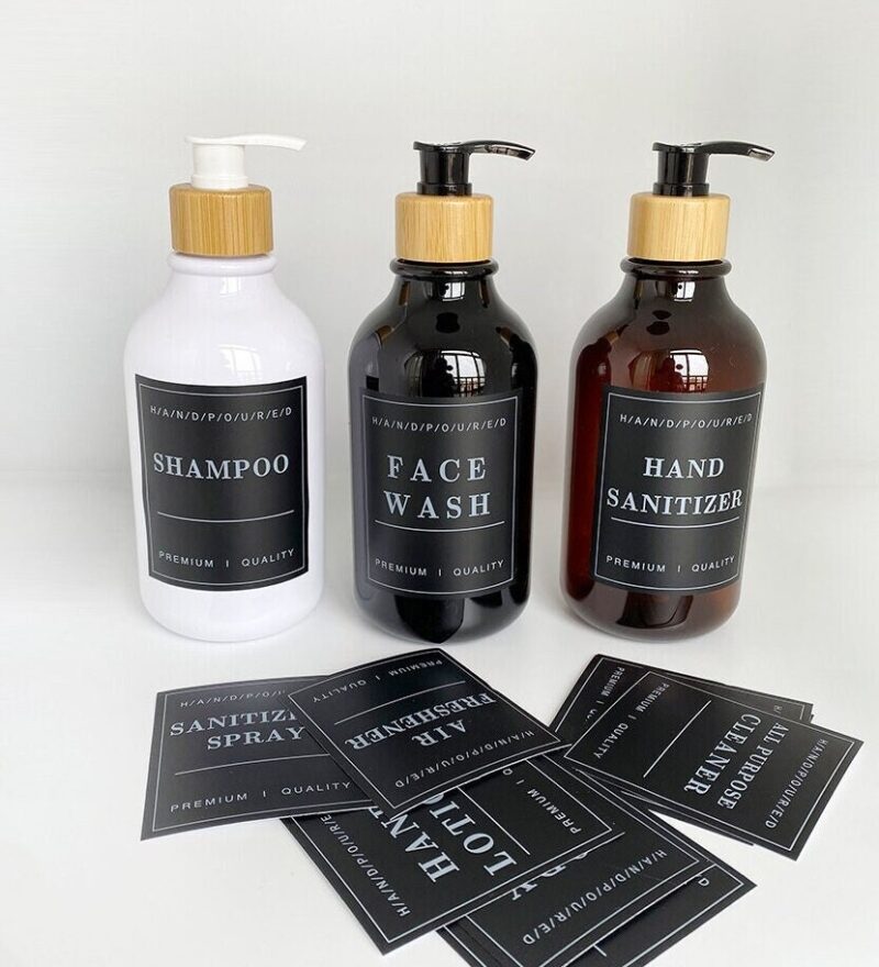 Three bottles of 12PCS Minimalist Bathroom Labels | Modern Bathroom Labels displaying soap and hand wash.